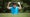 golfers gets angry and holds club over his head